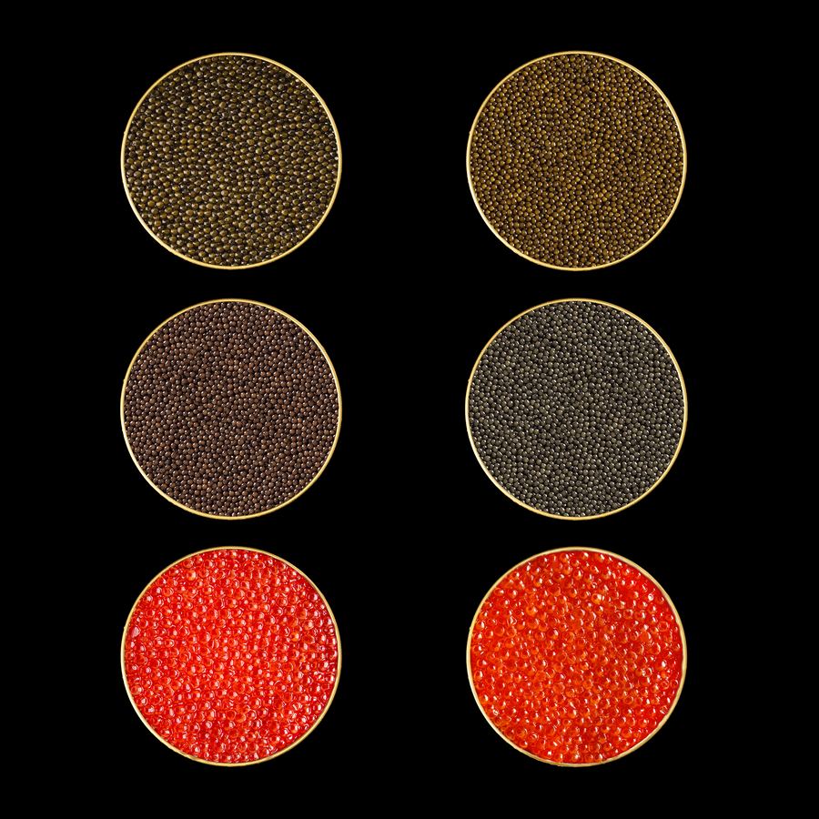 multiple tins of different colored caviar
