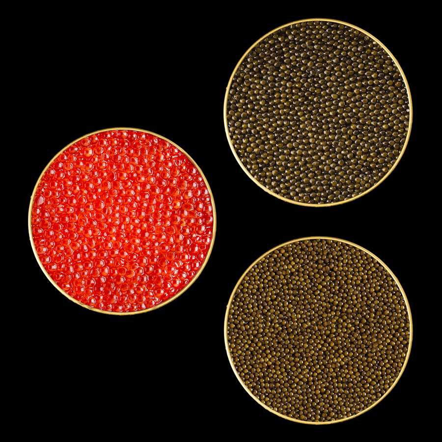 three tins of thee different colored caviar